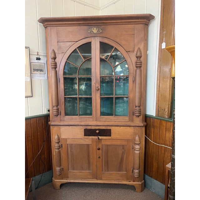 This is a large statement piece farmhouse french corner cupboard. This will give any room a built in cabinet look. It is...