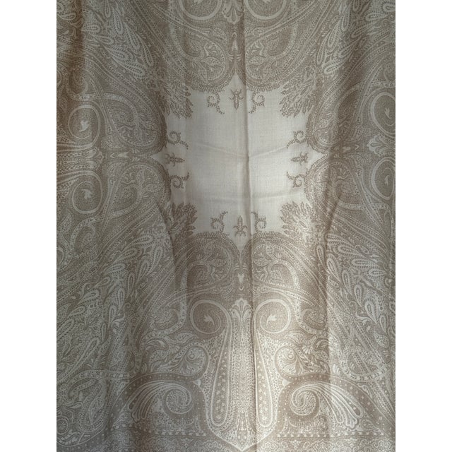 An absolutely stunning, oversized (57 x 57) silk and wool throw in ivory and beige. A central star motif is surrounded by...