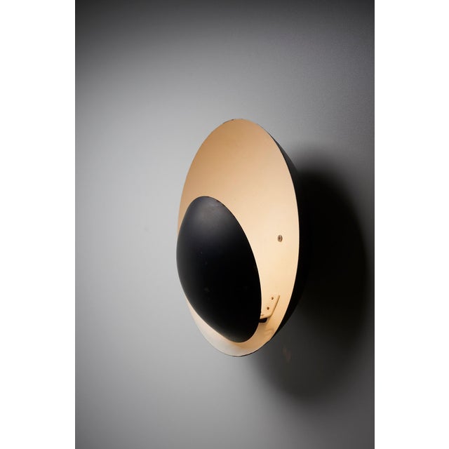 Introduce a visually striking and thoughtfully designed lighting piece to your space with the Wall Lamp by BuR Leuchten....