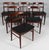 Henning Kjærnulf six dining chairs, new upholstered with black full grain aniline leather. Frame of solid rosewood. Made...