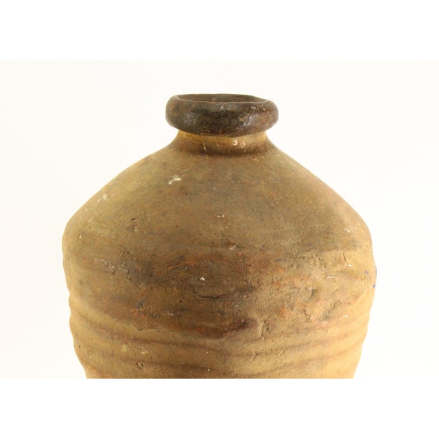 An early and impressive Spanish colonial terracotta jar, likely used to transport and store fine dessert wines or Olive...