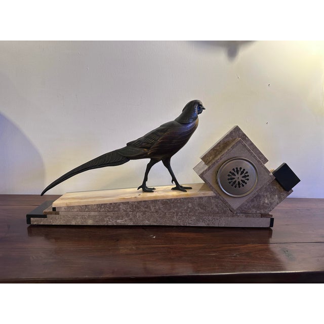 Extraordinary French table clock, signed on the base J. Rochard. Beautiful geometric shape combined with different types...