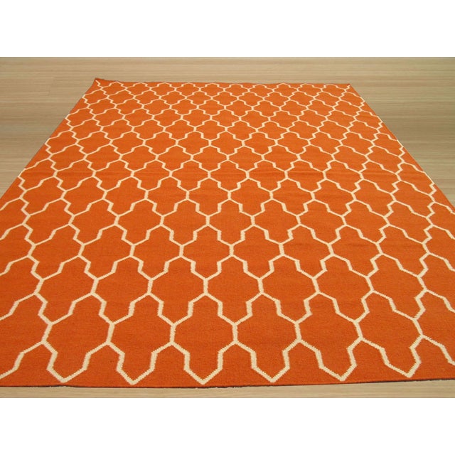 Classic Moroccan Yellow Flatweave Wool Rug. This striking piece features a bold, continuous ogee trellis pattern rendered...
