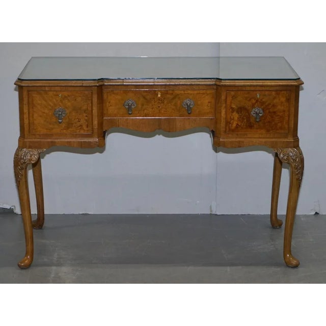 We are delighted to offer this stunning Denby & Spinks Leeds circa 1920 Art Deco burr walnut inverted breakfront console...