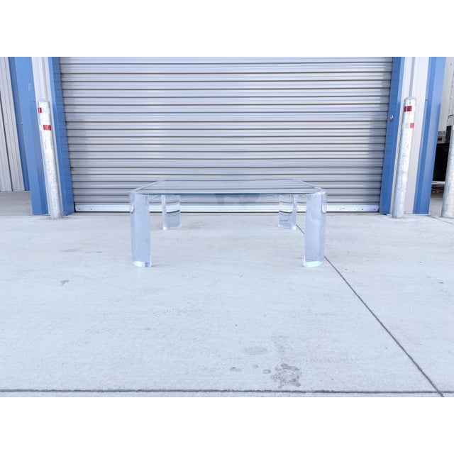 This sensational 1970s mid-century coffee table by Les Prismatiques exemplifies high-end acrylic design and architectural...