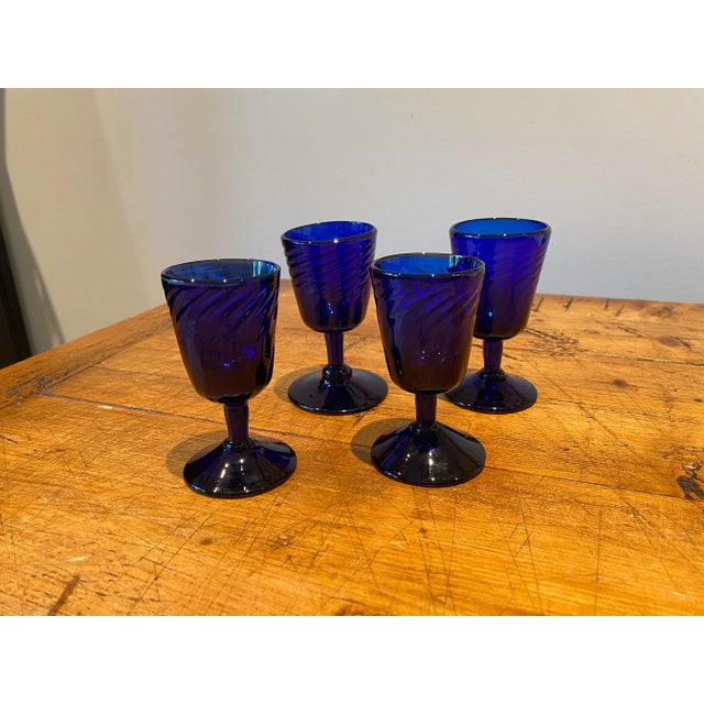 Striking Hand Blown Cobalt Blue Small Cordial Glasses with a Swirl Design. Set of 4.