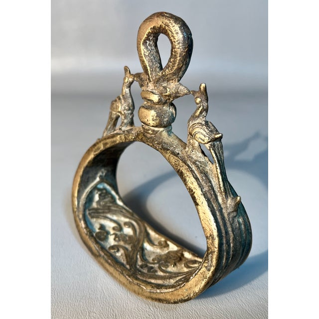 Imagine an Hindu Warrior mounting his horse to ready for battle in the late 19th century…This fully enclosed bronze...