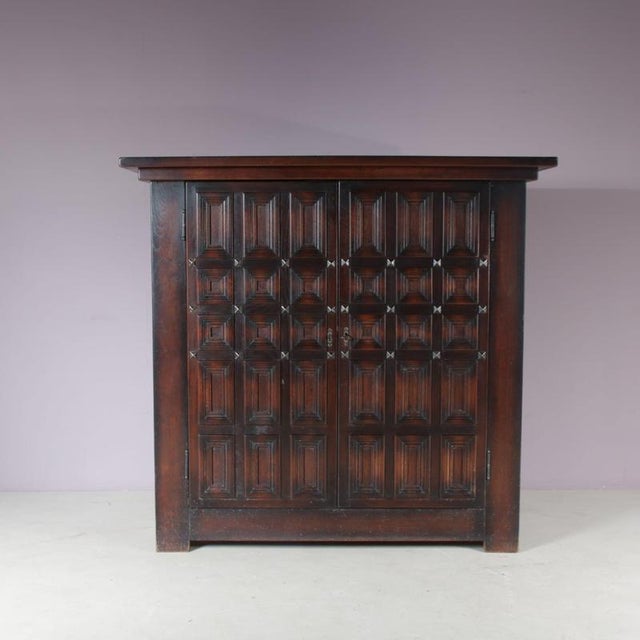 An eye-catching highboard cabinet manufactured in Spain around 1960. This beautiful piece has a real brutalist appearance,...