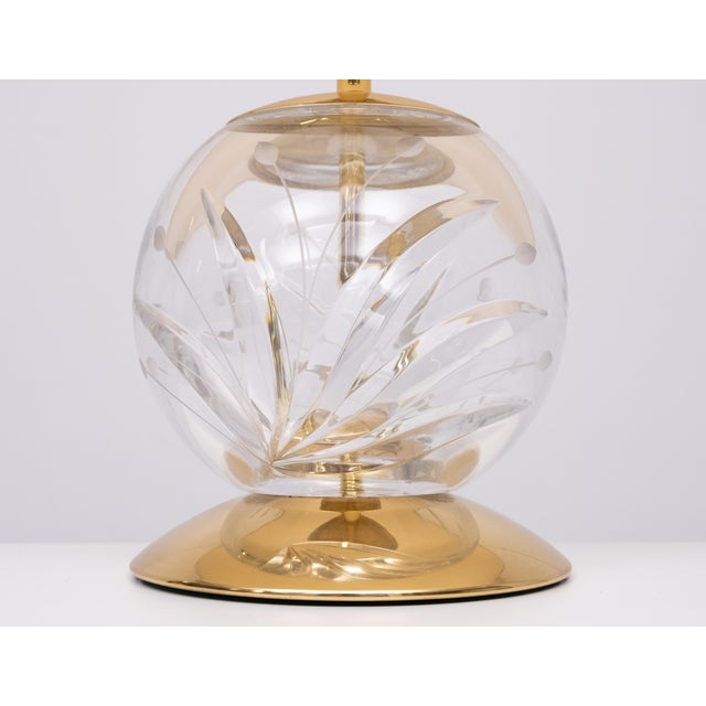 Beautiful Table lamp . Cut Chrystal Ball , comes with Brass fittings and the perfect matching Silk shade . Manufactured...