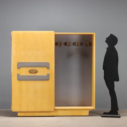 Vintage entryway cabinet with a concealed coat rack with sliding door, open compartment with drawer, shelves, and mirror....