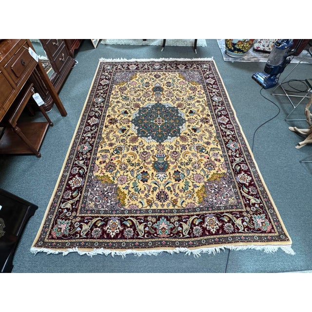 Design Plus Gallery presents a 6ft x 8ft 10in Yellow with Accent Color Area Rug. The rug is likely a Turkish/Oriental...