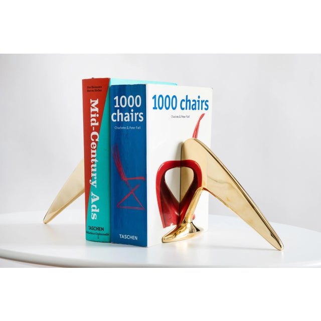 Pair of Carl Auböck model #4630 large brass bookends. Designed in the 1950s, this incredibly refined and sculptural pair...