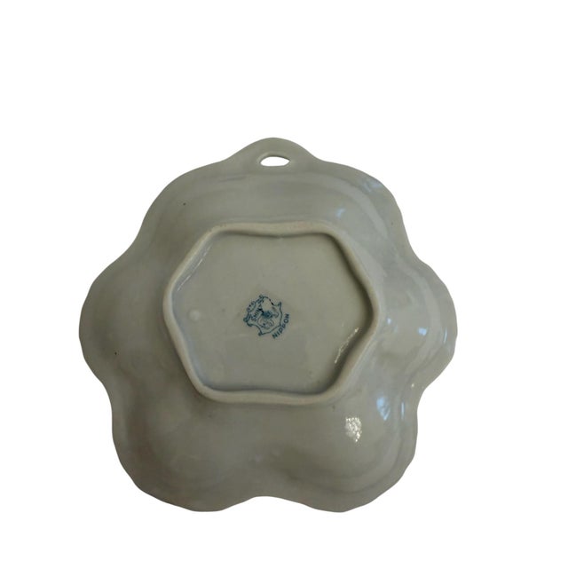 Nippon Shinzo Floral Scalloped Decorative Plate Crafted for hanging, this beautiful plate has a reticulated space for easy...