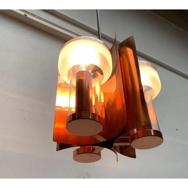 Imposing handlebar in copper, brass and glass from Cosack. The materiality and design language reminds of Scandinavian...