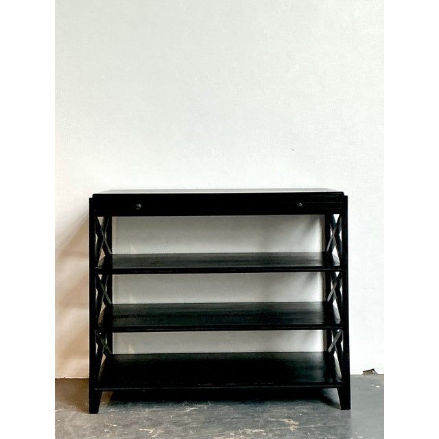 This elegant vintage console table blends architectural geometric precision with timeless functionality. Featuring a...