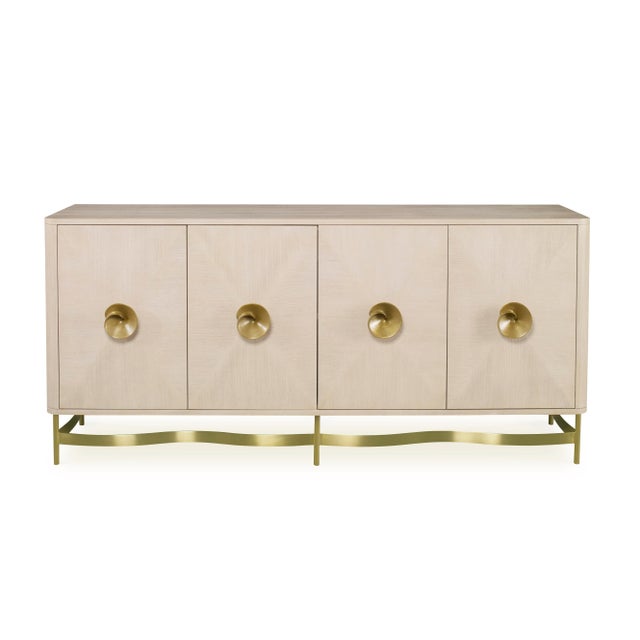 The Bardot credenza features beautiful hand sculpted brass hardware in the shape of a blooming flower with complementing...