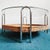 Vintage mid-century retro design coffee table from the 1970s featuring a combination of chrome, glass, and rattan. This...