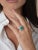 This is part of Chairish’s Fine Jewelry assortment. 3.31 Carat vivid green natural Emerald center stone mounted with 2...