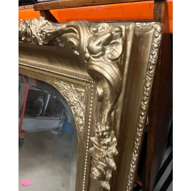 Up for consideration is a beautiful vintage oversized ornate French beveled mirror. This would look lovely in your home,...