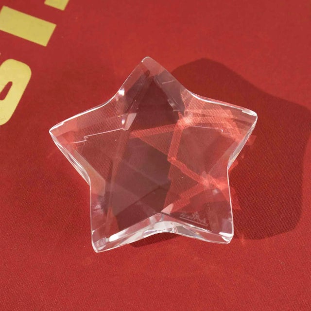 Rosenthal star faceted crystal paperweight. Perfect for displaying on your desk or as an coffee table object. Signed with...