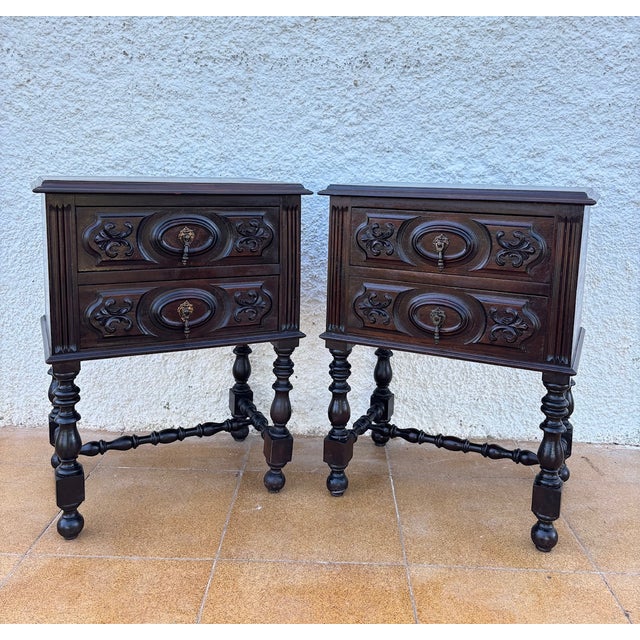 This elegant pair of Spanish bedside tables dates from circa 1930 and showcases the refined craftsmanship of early 20th-...