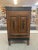 This Dutch colonial cabinet opens from the top, front and back as shown. Every side is enhanced with Carved wood Floral...