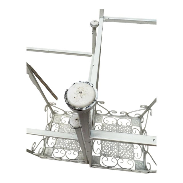 Hollywood Regency Pair of Vintage Indoor/Outdoor Hollywood Regency Graduated Metal Plant Stands, Distressed Ivory Scrollwork For Sale - Image 3 of 10