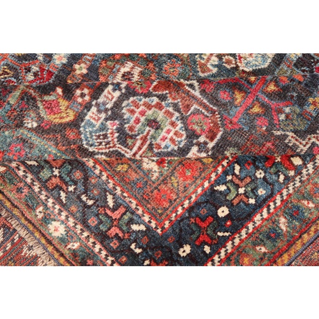 Antique Persian Qashqai Rug With Intricate Tribal Motifs and Rich Color Palette 6'10"x9'3" For Sale - Image 10 of 11