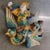 Chinese hand painted ceramic tile-works warrior riding a phoenix wall art. There is a hook on the back and it is very easy...