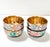 A colorful set of four 1950s Japanese porcelain salt cellars with hand-painted floral decoration and richly gilt...
