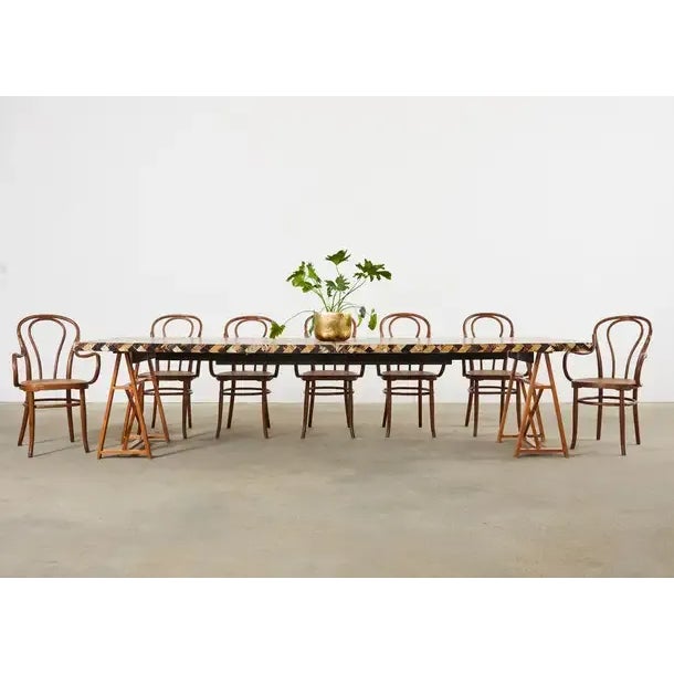 Dramatic extending dining table with two leaves produced in the 70s in Colombia by William Piedrahita for Thomas Britt....