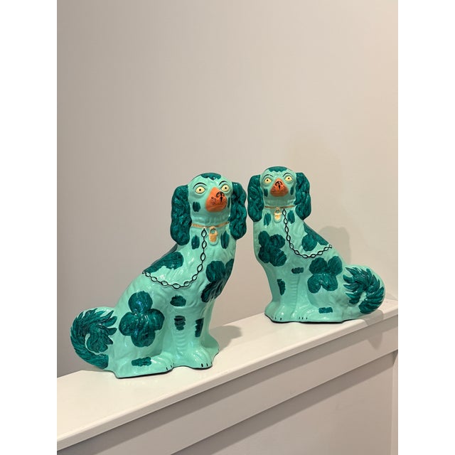 Charming vintage Staffordshire-style Paper Mache dog pair, hand-painted in a striking turquoise glaze with deep green...