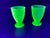 Antique yellow uranium glass set two (2) pieces. The set has a beautiful fish scale or scallop flare. One glass has a...