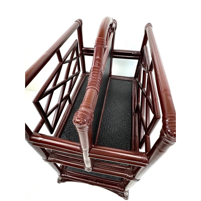 This striking Mid-Century rattan magazine rack brings a touch of vintage flair and functional charm to any space. Crafted...