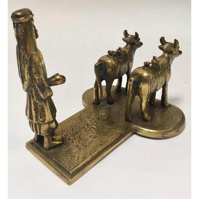 Figurative Brass Hindu Temple Oil Lamps Figures a Two Cows and Holly Man Standing For Sale - Image 3 of 13