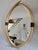 Unusual 1970's faux tusk mirror with patinated brass accents manufactured by Chapman in 1976. Made of a composite...
