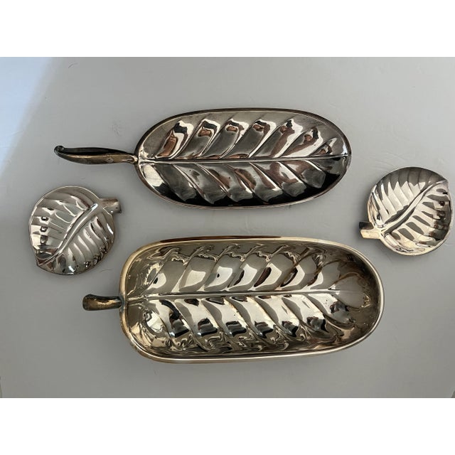 Classic, elegant silver-plate leaf serving dishes/bowls. Perfect for the holidays. Two small for nuts or bon bons, could...