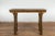 A Chinese Qing Dynasty period rustic console table from the 19th century with carved legs and double side stretchers....