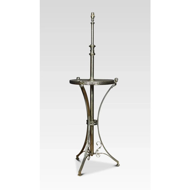 Late 19th Century brass and onyx standard lamp, having turned central column, to the circular onyx shelf. All raised up on...