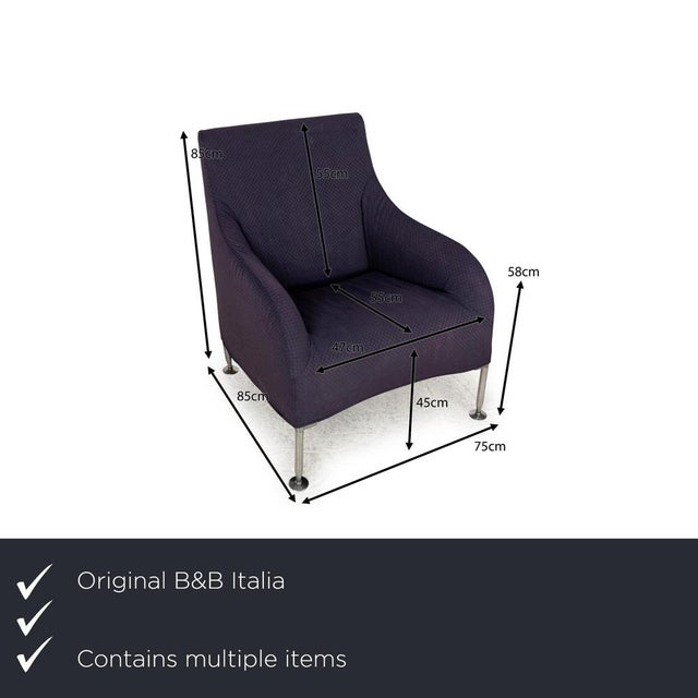 The Florence armchair set from B&amp;B Italia is covered in a purple-lilac fabric and stands on narrow metal legs. It is...