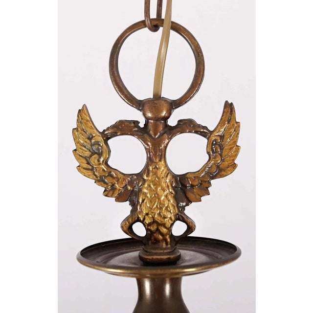 Beautiful five-arm flemish chandelier made of patinated brass. The chandelier has a completely restored electrical...
