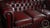 Wood Vintage Oxblood Leather Three-Cushion Chesterfield Sofa For Sale - Image 7 of 9