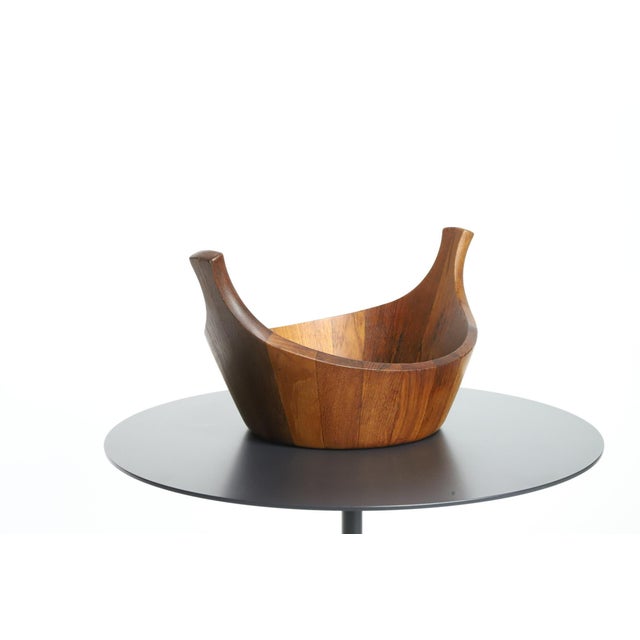 Introducing a timeless classic - the Dansk Teak Staved Viking Salad Bowl, designed by the legendary Jens Quistgaard....