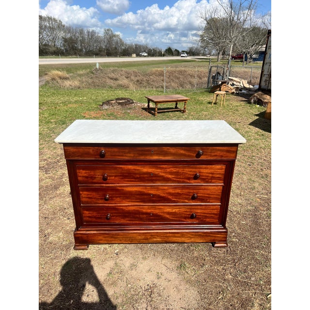19th Century French Louis Philippe Commode from Lyon France. Made of solid Flam Mahogany, with a white Carrara Marble top,...