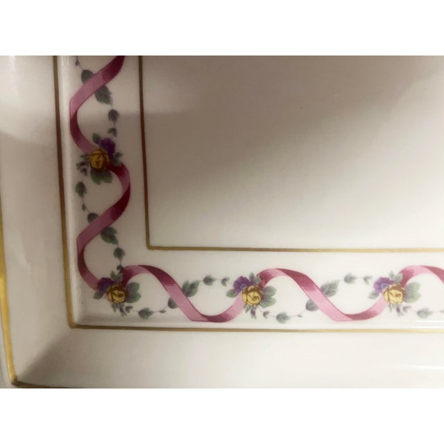 Richard Ginori porcelain tray Made in Italy, measuring 15” by 11”, with ribbon and flower border design in soft colors....