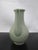 Chinese Longquan Celadon ewer. Jade green glazed pottery vessel with long handle and spout. Originated in the Longquan...