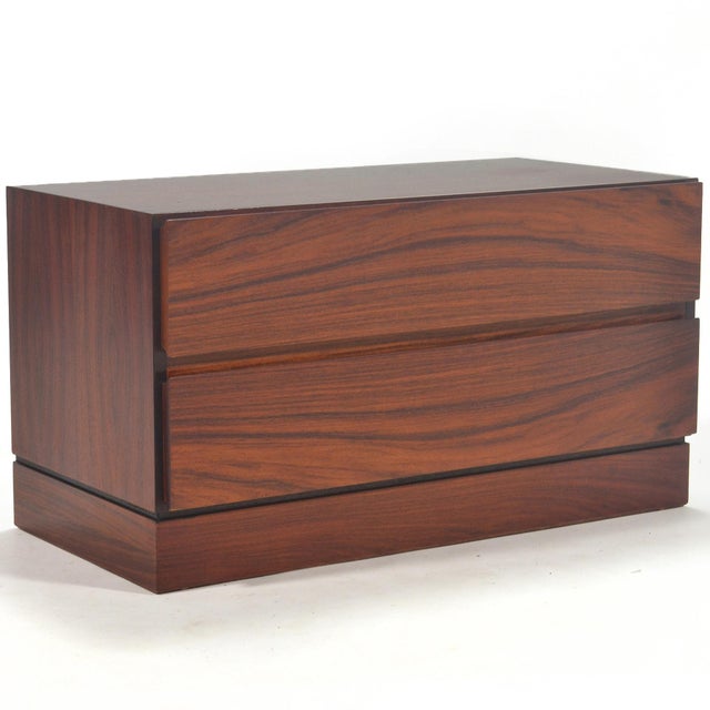 This handsome Danish two-drawer cabinet designed by Arne Wahl Iversen for Vinde Mobelfabrik is clad in beautiful, rich...