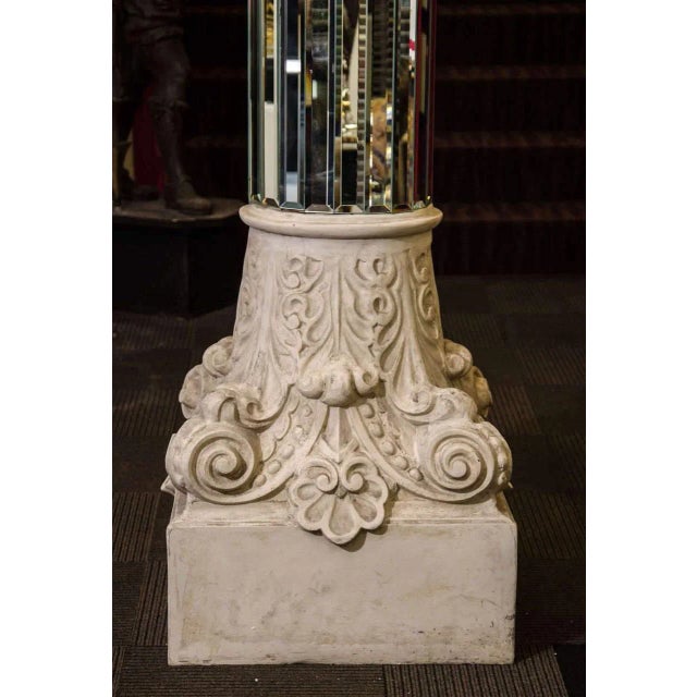 A Fantastic pair of High End monumental mirrored columns with ornately scrolled capitals.Perfect for a Huge Loft that...