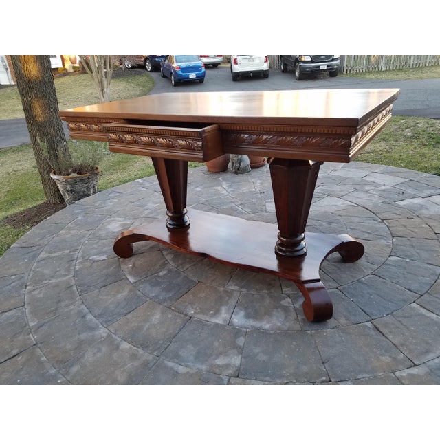 Antique rosewood library table. in our family since 1970. Possibly refinishedo prior to then. Gorgeous antique condition....