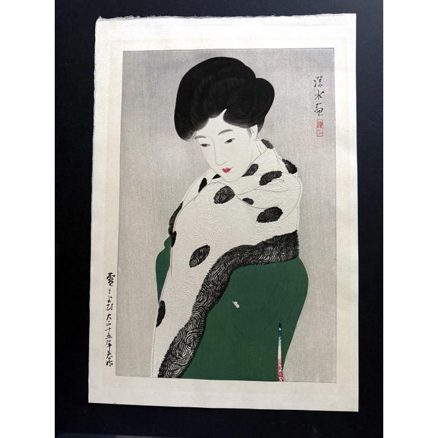 A Japanese Woodblock print by Itō Shinsui (1898-1972) entitled It Looks Like Snow (commonly known as Snow is Coming;...